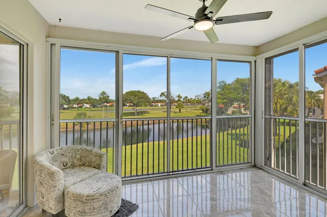 a view of a lake with houses in the background