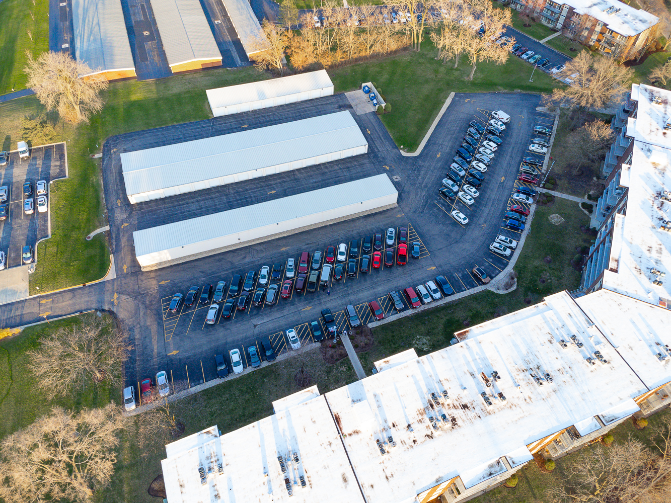 2900 Maple Avenue, Unit 19E Downers Grove, IL 60515 - Photo 5 of 32 a view of a bench in front of building