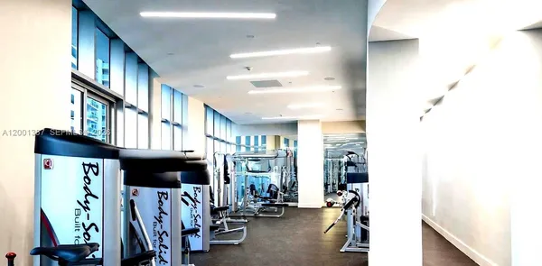 a view of a room with gym equipment