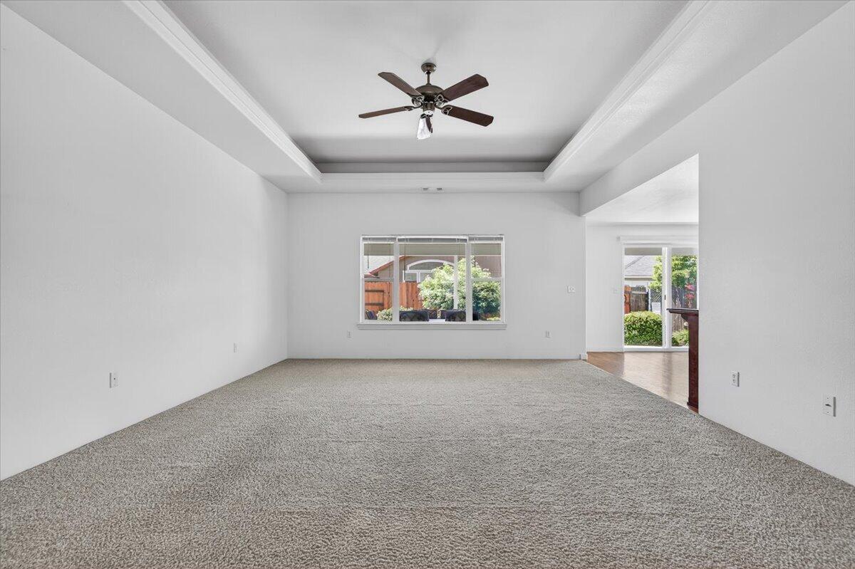 2618 Rabun Way Central Point, OR 97502 - Photo 21 of 42 an empty room with windows and ceiling fan