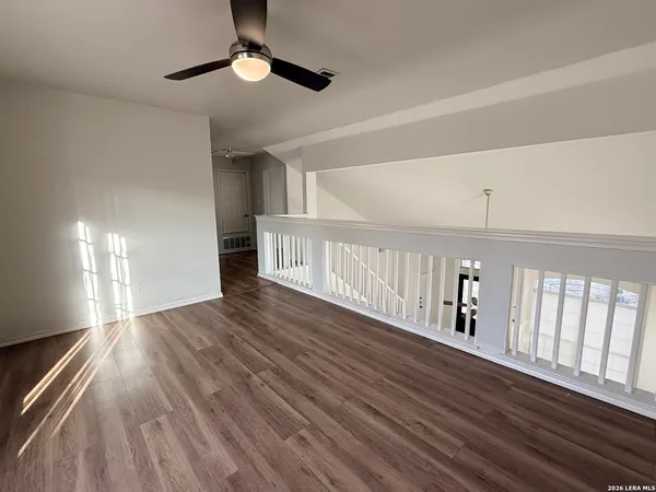 a view of entryway with wooden floor