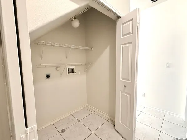 a view of a hallway and closet