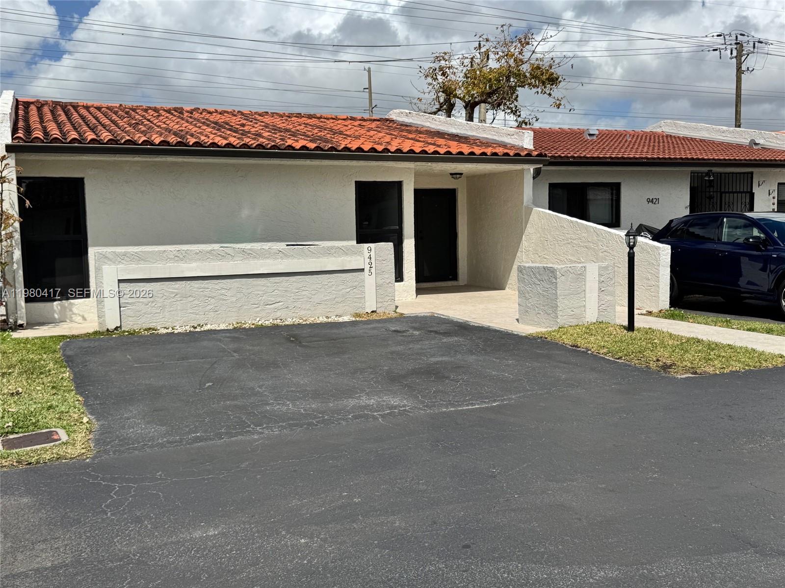 9425 Southwest 4th Lane, Unit 9425 Miami, FL 33174 - Photo 1 of 14 a house with a outdoor space
