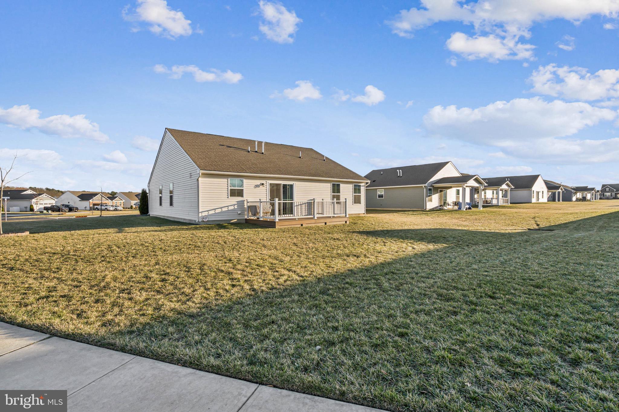 15 Truman Road Berlin, NJ 08009 - Photo 23 of 24 a front view of a house with a garden and yard