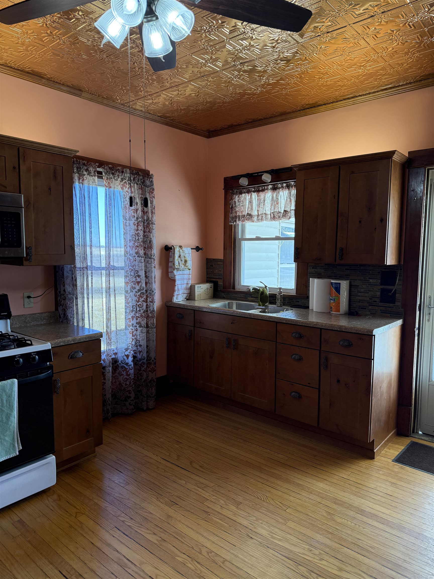5940 East German Valley Road German Valley, IL 61039 - Photo 7 of 29 a kitchen with granite countertop wooden cabinets and a granite counter top