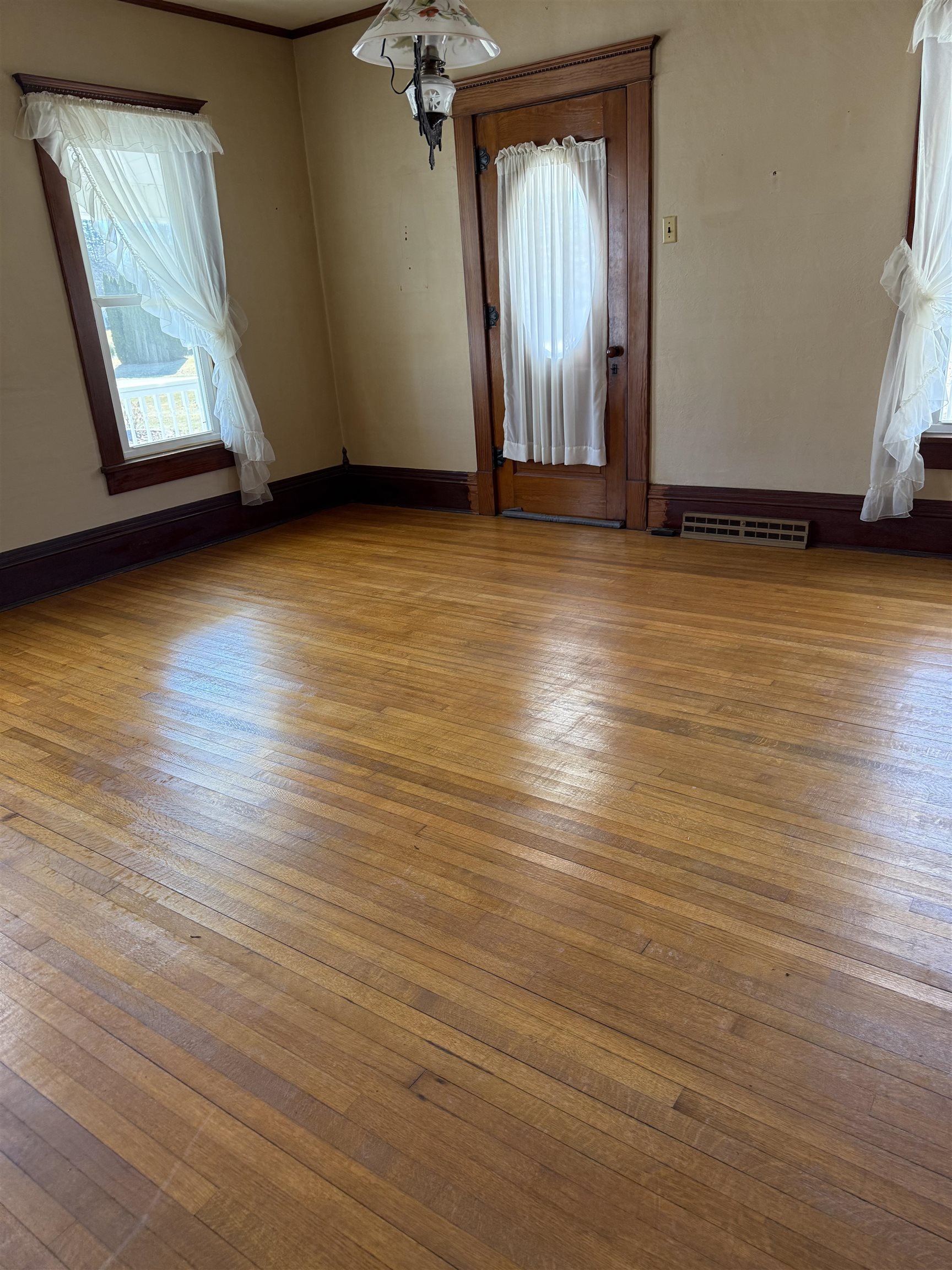 5940 East German Valley Road German Valley, IL 61039 - Photo 10 of 29 an empty room with wooden floor and windows