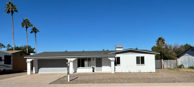 a front view of a house with a porch