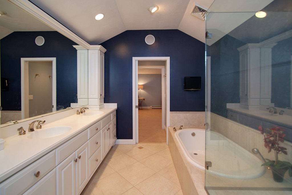 84 Troon Place Mashpee, MA 02649 - Photo 22 of 30 a spacious bathroom with a tub sink and mirror