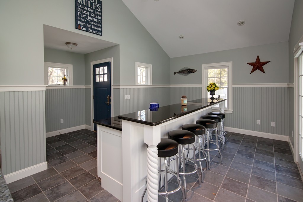 84 Troon Place Mashpee, MA 02649 - Photo 27 of 30 a dining room with furniture and a window
