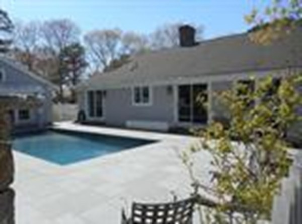 84 Troon Place Mashpee, MA 02649 - Photo 5 of 30 a view of a house with a yard