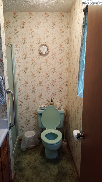 3043 Bamboo Road Boone, NC 28607 - Photo 10 of 25 a bathroom with a toilet and a sink