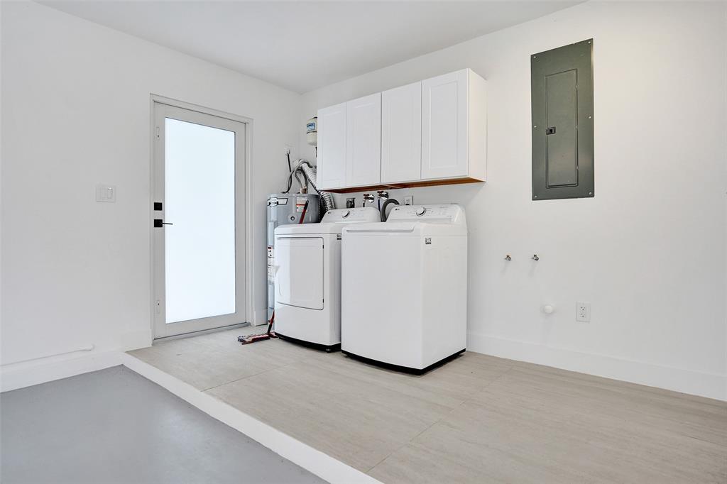 699 Northeast 70th Street Boca Raton, FL 33487 - Photo 41 of 60 a view of a room with utility room