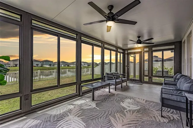 a aerial view of a house with a yard
