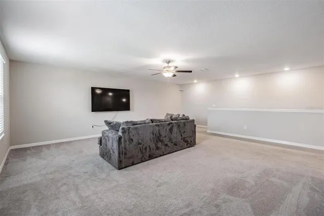 a view of a lake with houses in the back