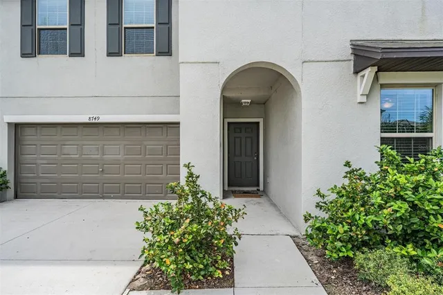 a view of a swimming pool with a lounge chairs
