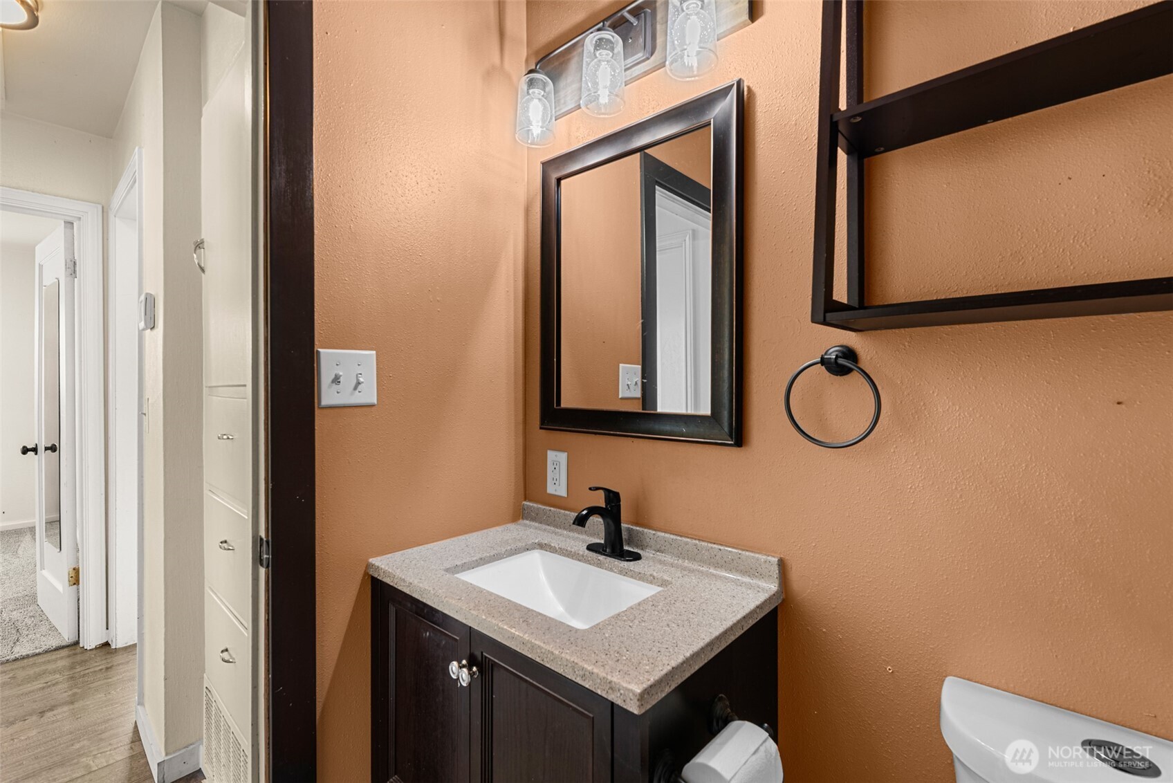 523 K Street Southwest Quincy, WA 98848 - Photo 17 of 35 a bathroom with a sink and a mirror