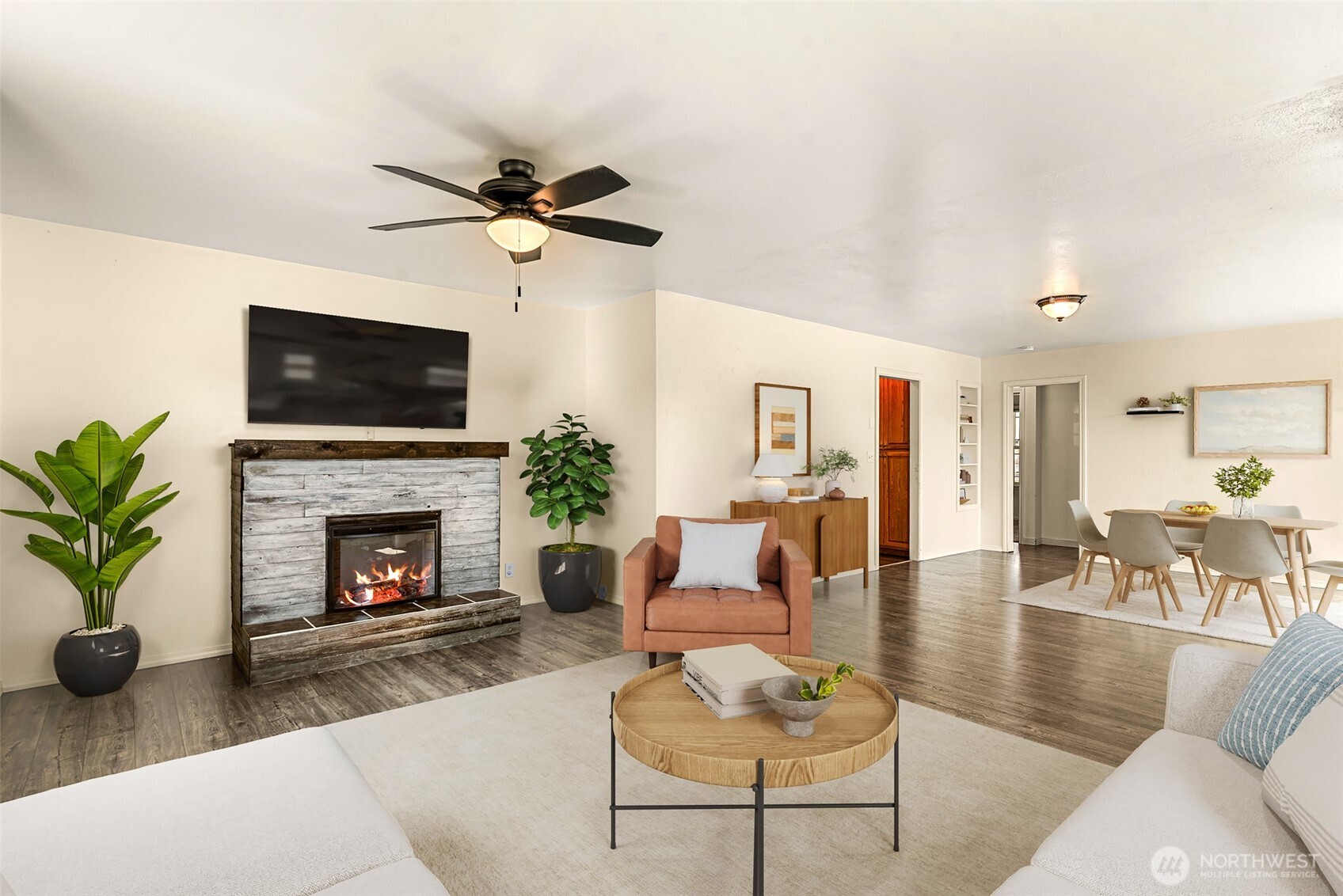 523 K Street Southwest Quincy, WA 98848 - Photo 2 of 35 a living room with furniture a fireplace and a flat screen tv