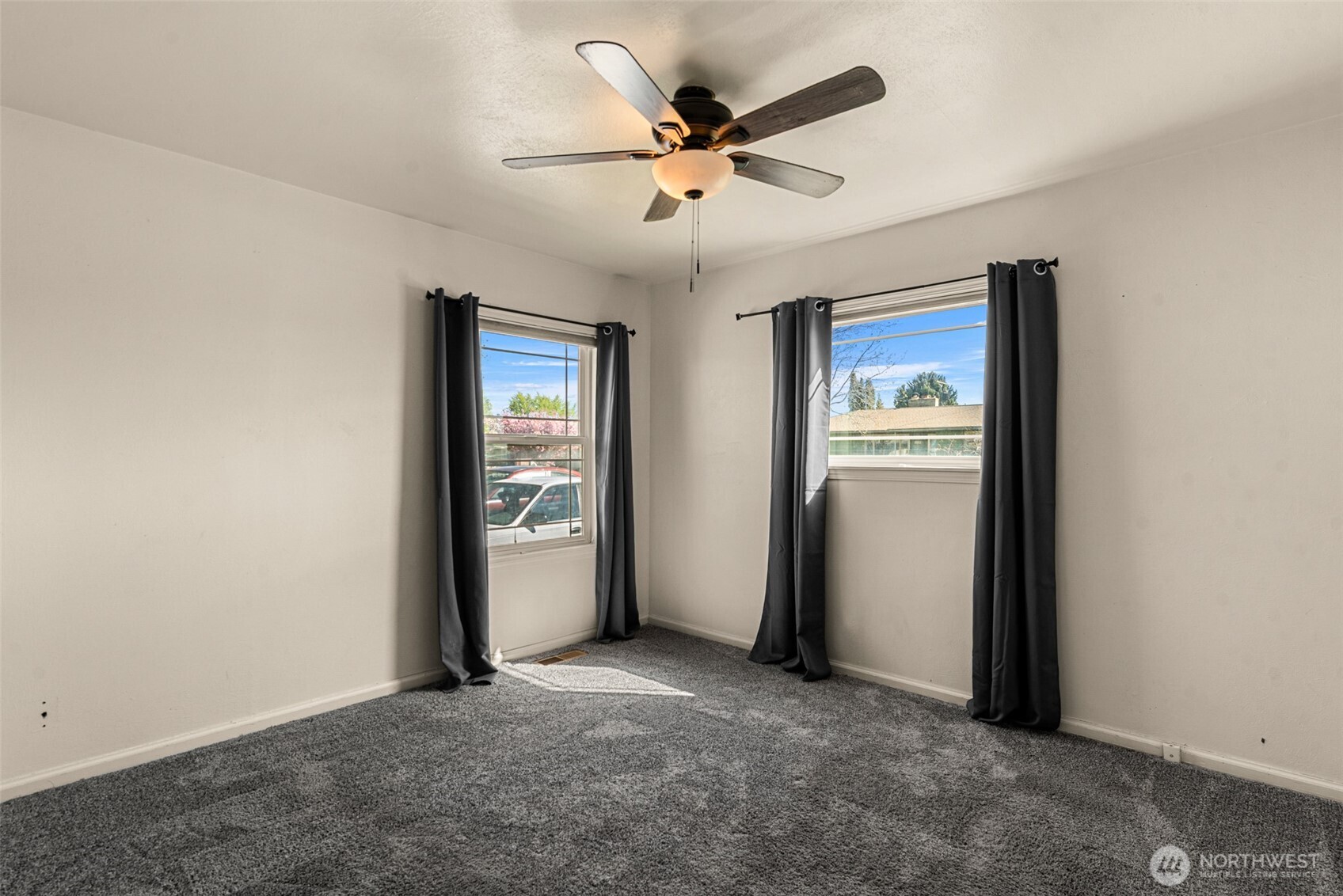 523 K Street Southwest Quincy, WA 98848 - Photo 22 of 35 an empty room with closet and fan