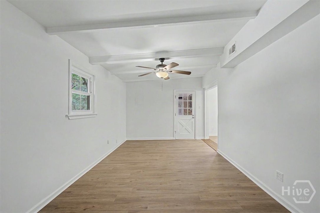 12407 Deerfield Road Savannah, GA 31419 - Photo 16 of 34 Bonus living room area leads into the back patio