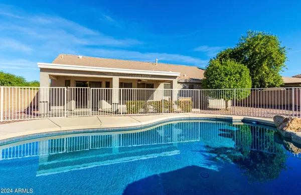a view of a house with a swimming pool