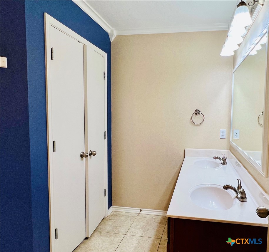 8210 Sunset Trail Temple, TX 76502 - Photo 9 of 15 a bathroom with a sink and a mirror