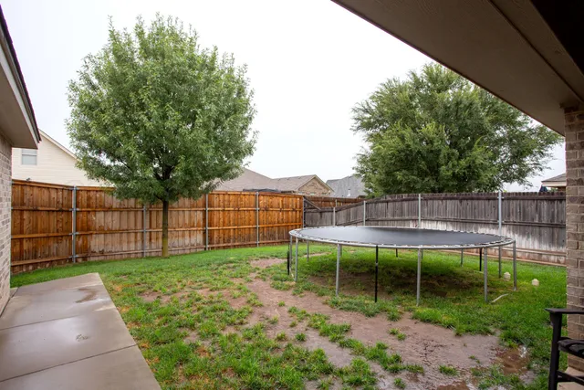 a view of a backyard with a garden