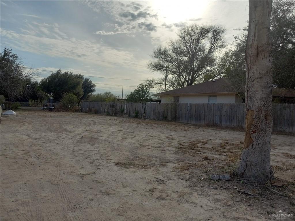 601 Patricia Street Mission, TX 78572 - Photo 2 of 3 a backyard of a house with lots of green space