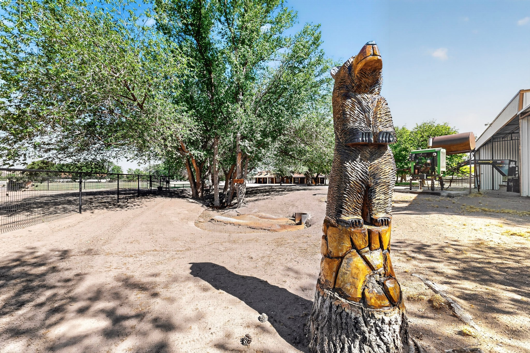 26 Schmittle Road Socorro, NM 87801 - Photo 70 of 80 Irrigation pump behind bear carving. Additional water well not included in sales price of the property