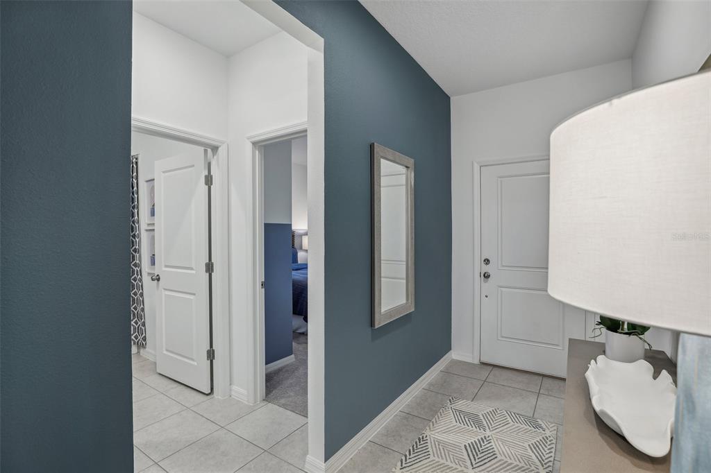 9600 Starling Loop Leesburg, FL 34788 - Photo 3 of 36 a bathroom with a sink and a mirror