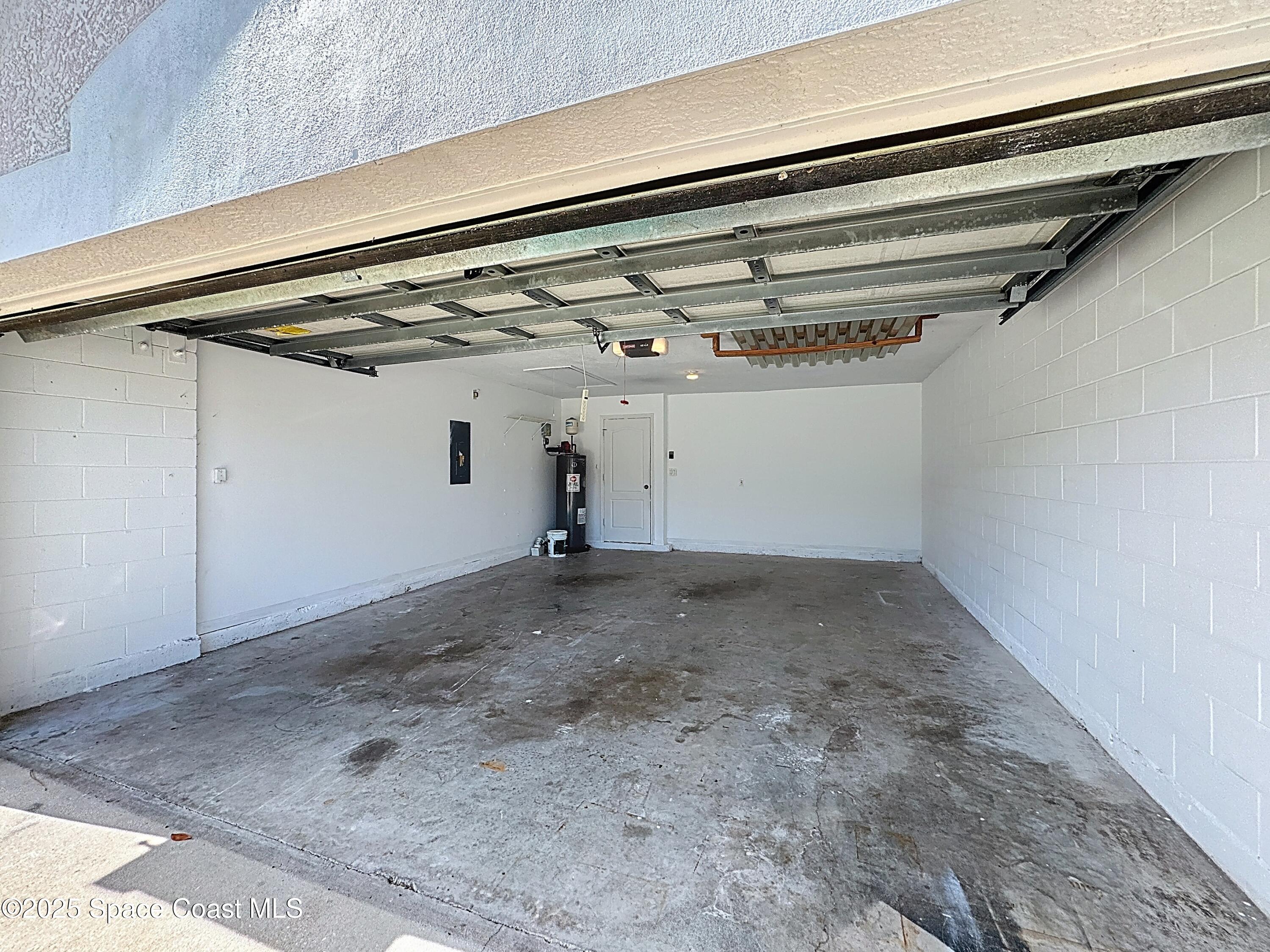 7370 Joshua Place Cocoa, FL 32927 - Photo 16 of 21 a view of a garage