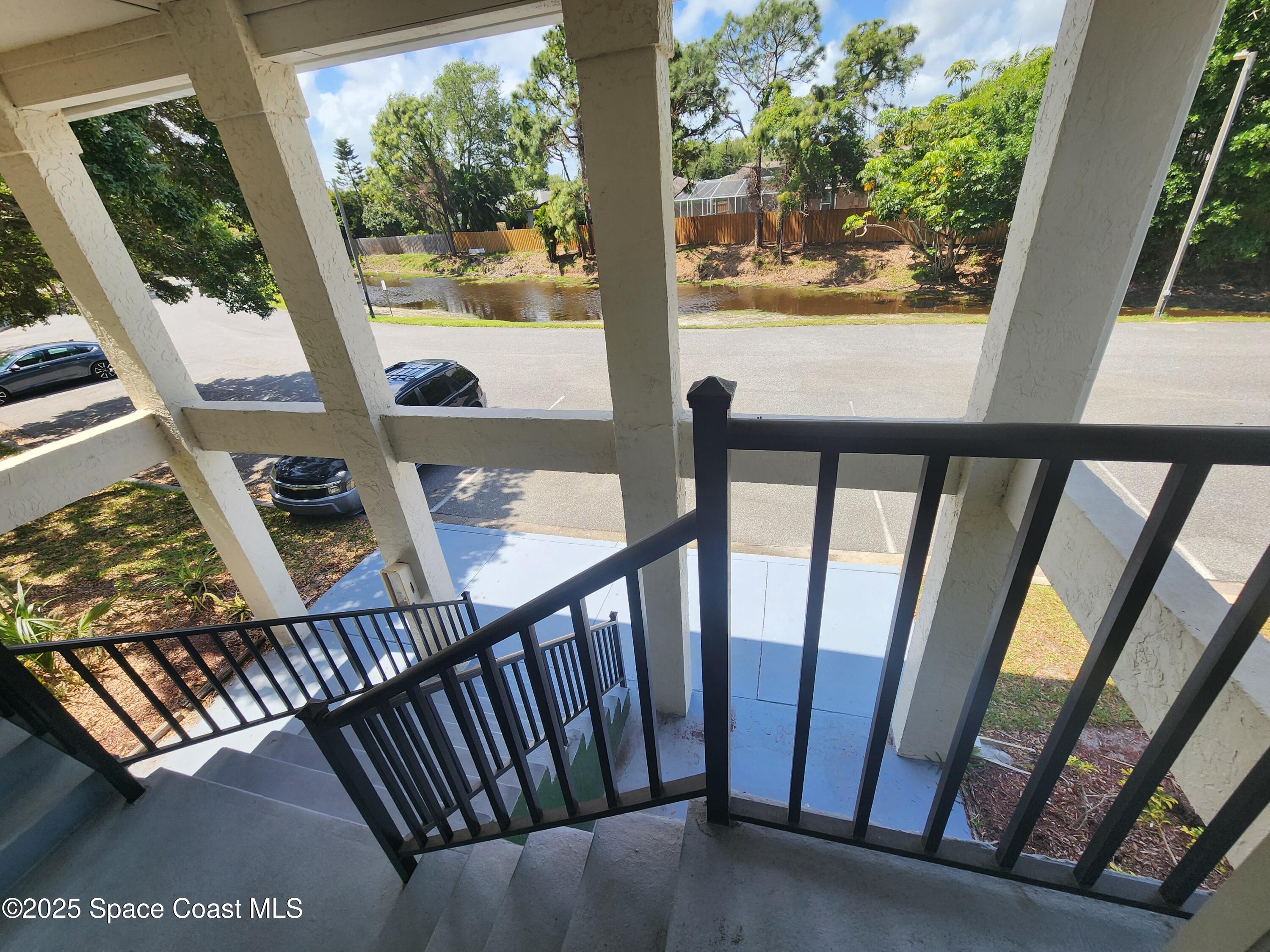 2220 Flower Tree Circle Melbourne, FL 32935 - Photo 16 of 22 a view of an outdoor from deck