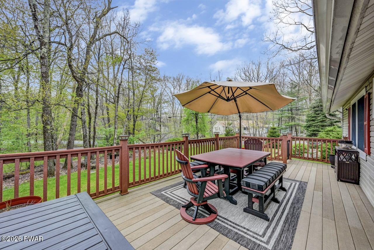 103 Forest Drive Hawley, PA 18428 - Photo 62 of 85 a view of a roof deck with furniture and wooden floor