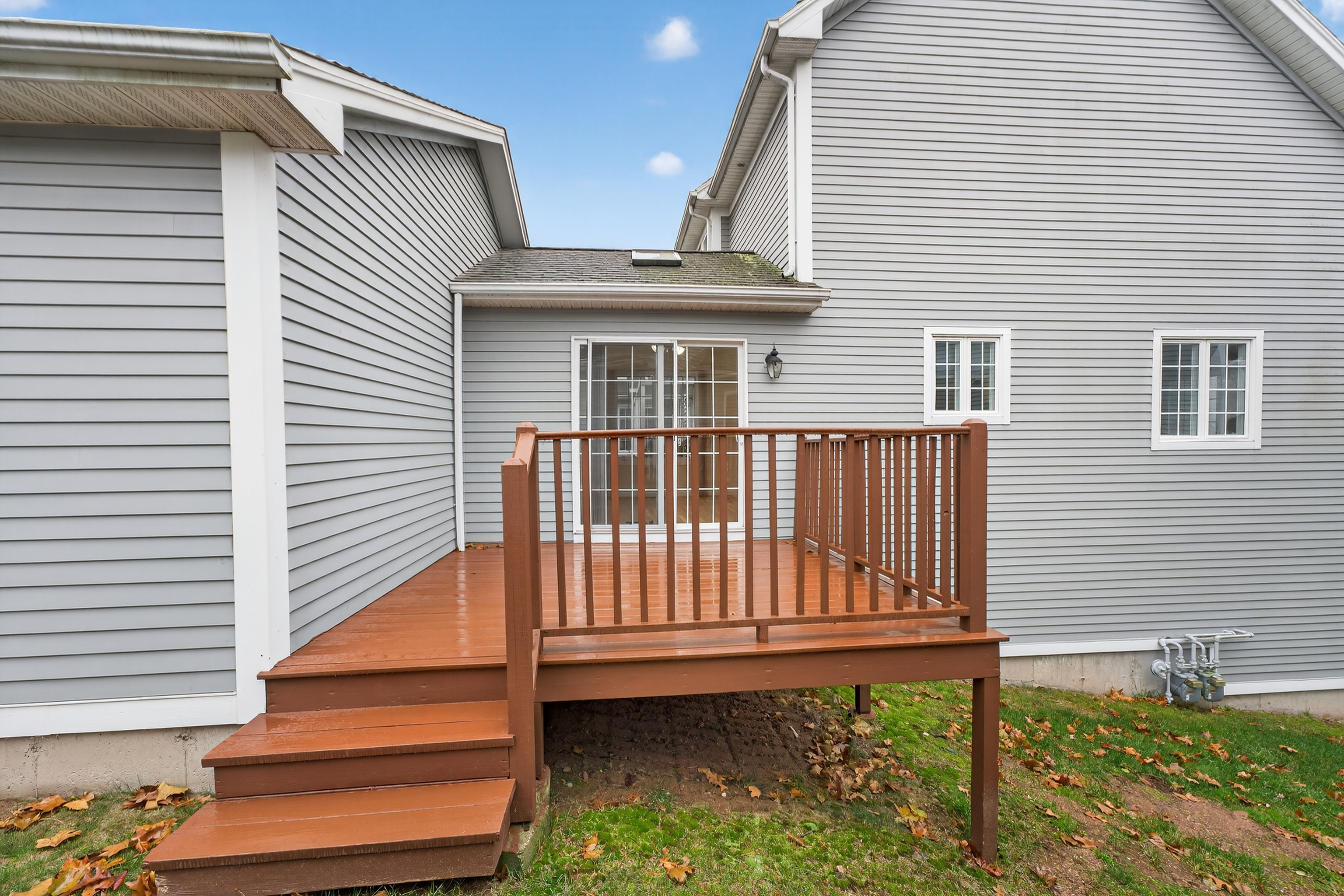 43 Copley Road, Unit 43 Glastonbury, CT 06073 - Photo 22 of 37 a view of a house with a small yard and wooden floor and fence
