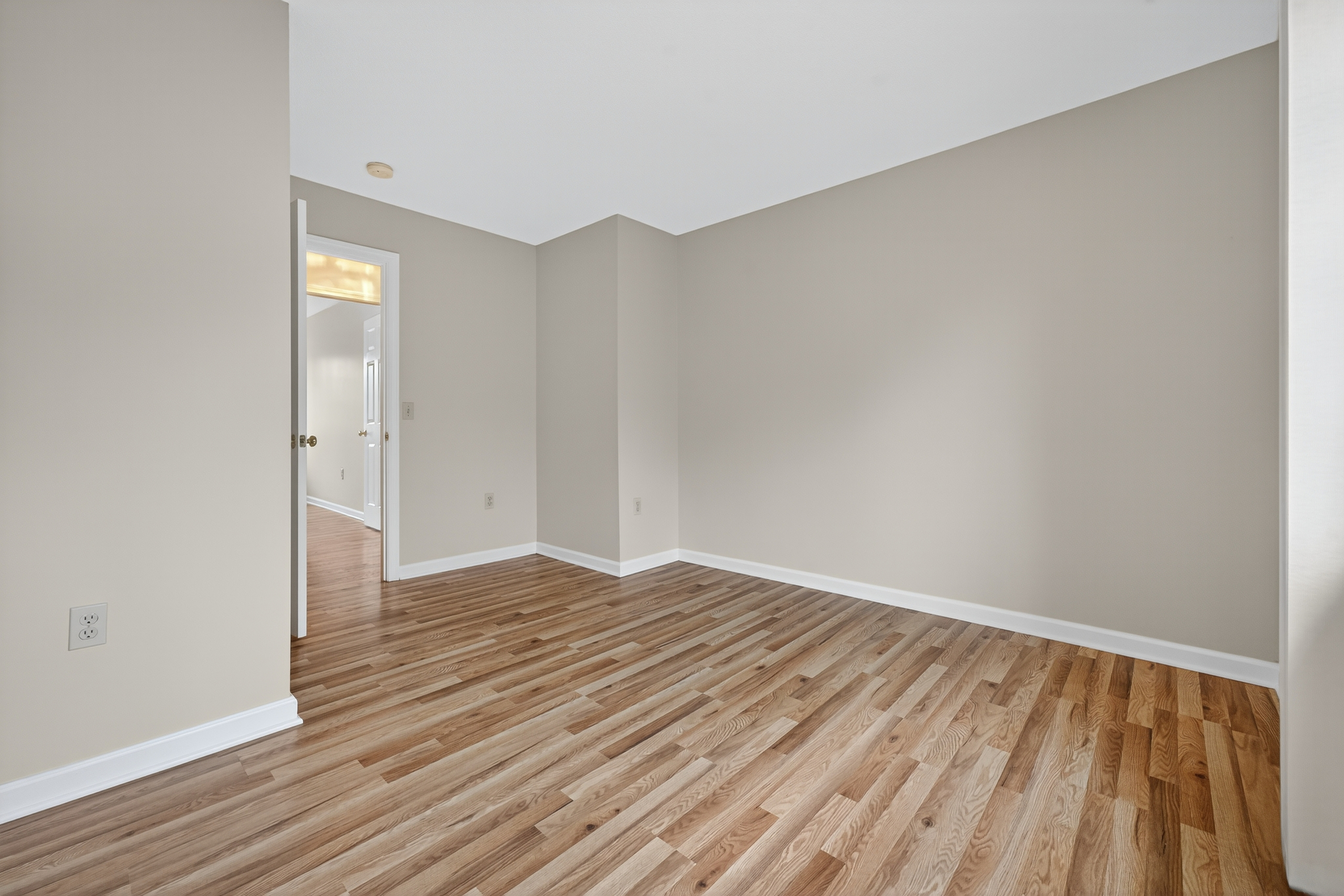 43 Copley Road, Unit 43 Glastonbury, CT 06073 - Photo 29 of 37 a view of empty room with wooden floor and fan