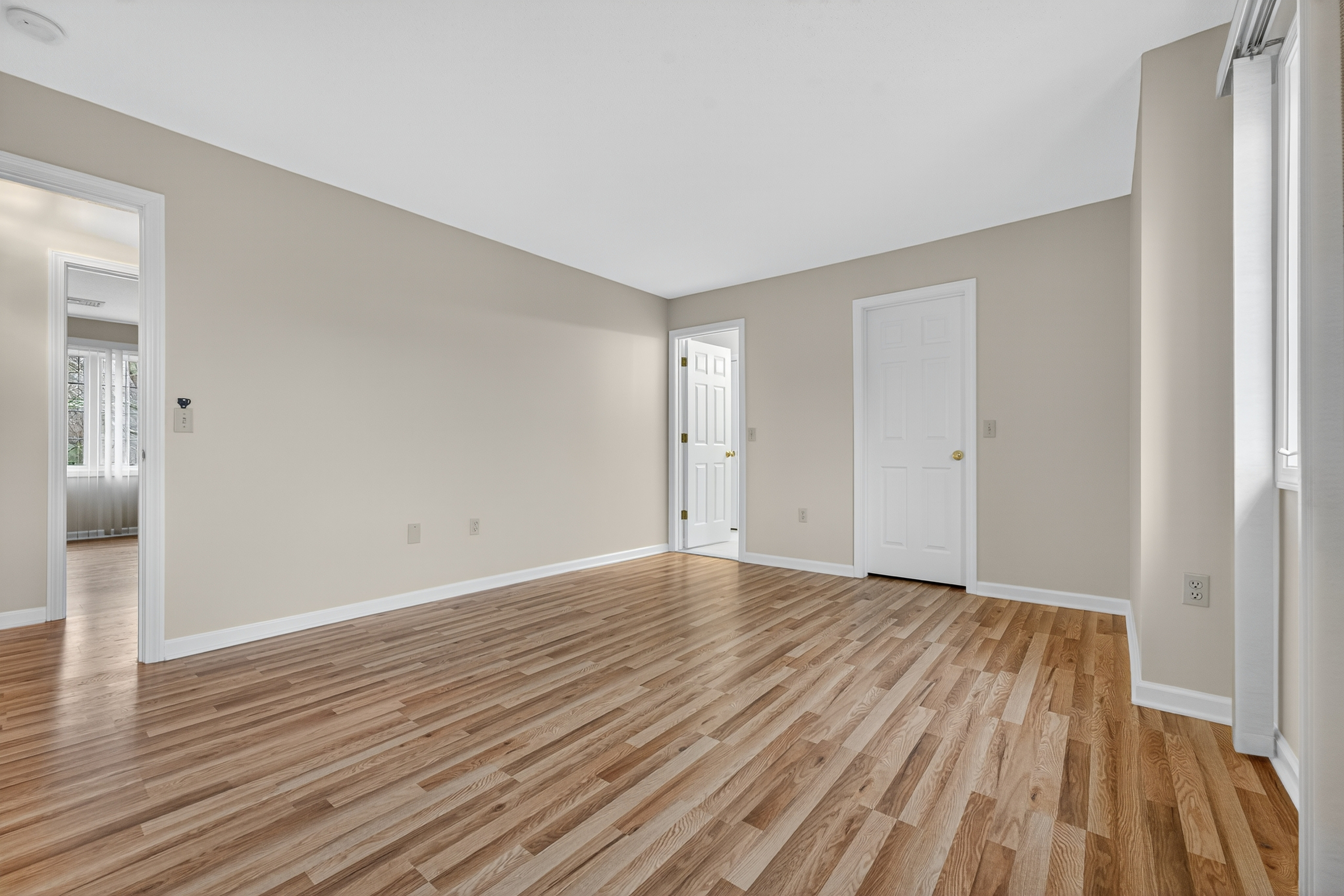 43 Copley Road, Unit 43 Glastonbury, CT 06073 - Photo 30 of 37 a view of an empty room with wooden floor