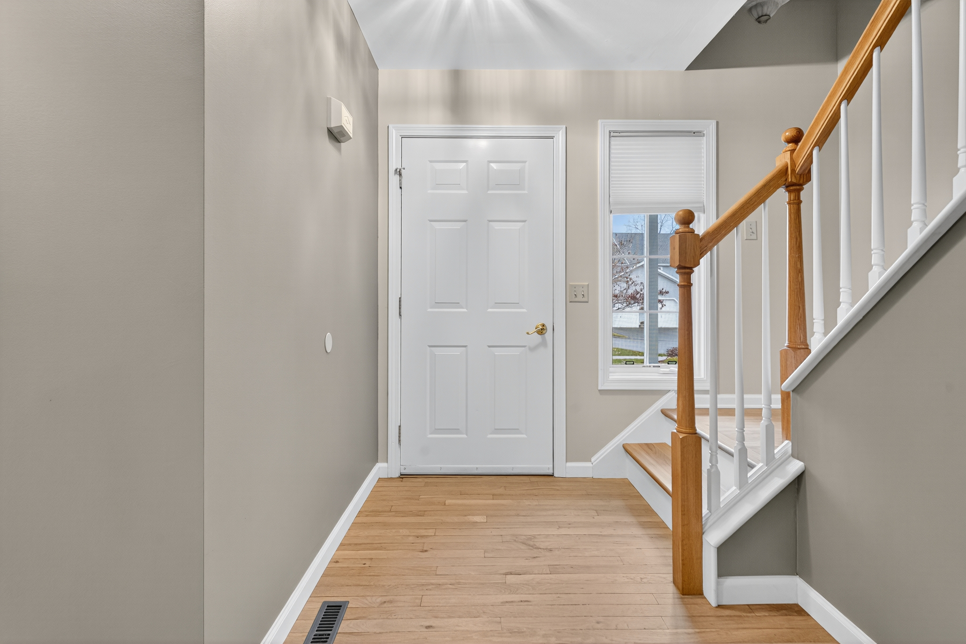 43 Copley Road, Unit 43 Glastonbury, CT 06073 - Photo 5 of 37 a view of front door with wooden floor and stairs
