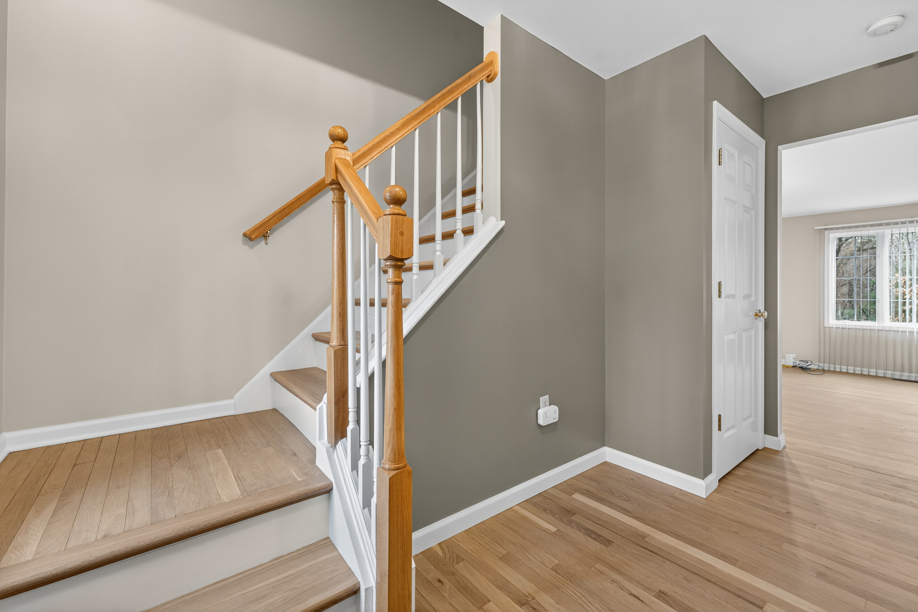 43 Copley Road, Unit 43 Glastonbury, CT 06073 - Photo 6 of 37 a view of entryway and hall with wooden floor