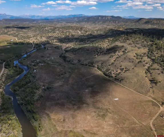 a view of a lake with mountain