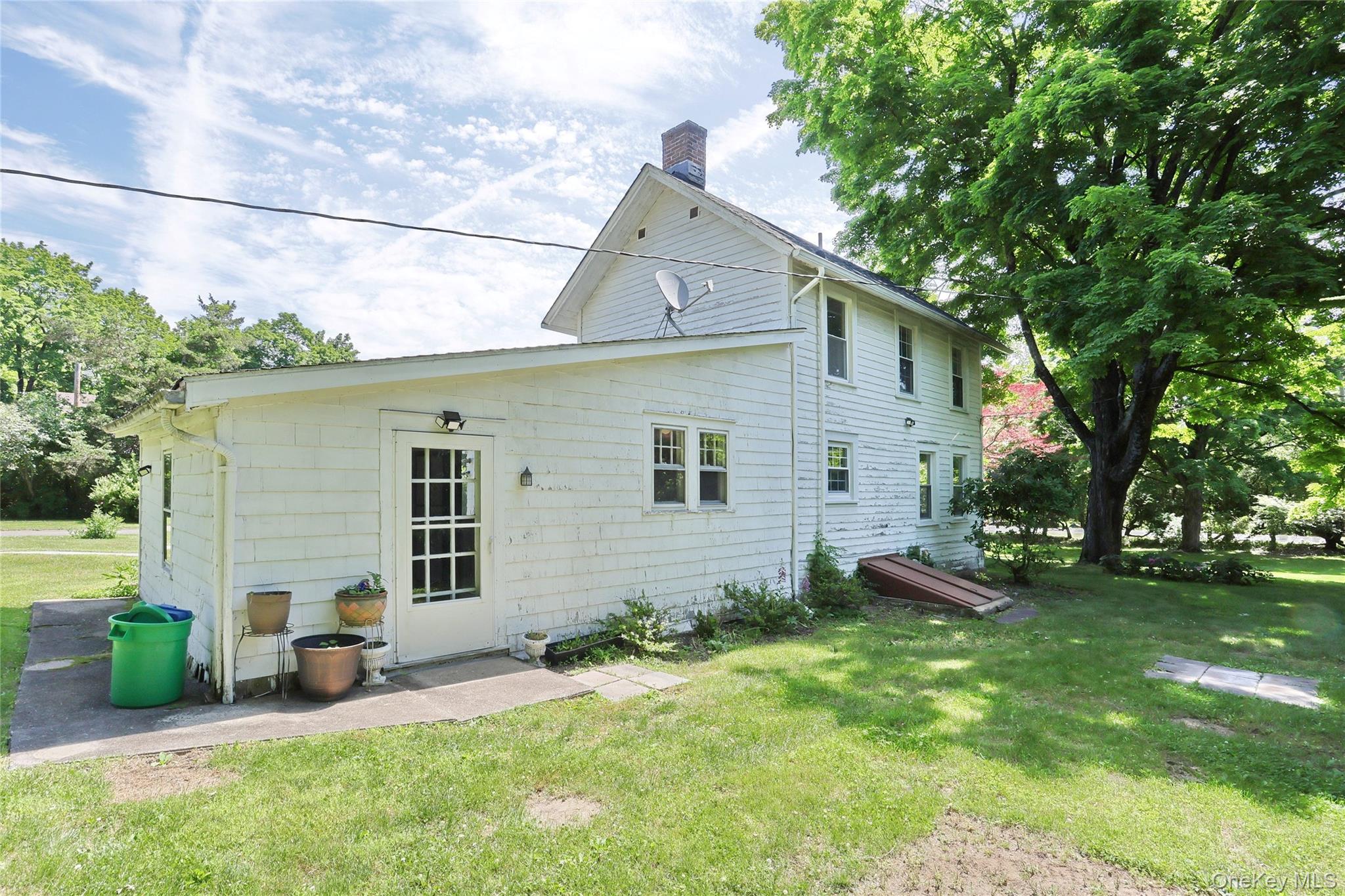 500 Haverstraw Road Suffern, NY 10901 - Photo 28 of 36 a backyard of a house with seating space