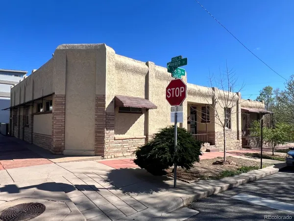 a view of a house with a street