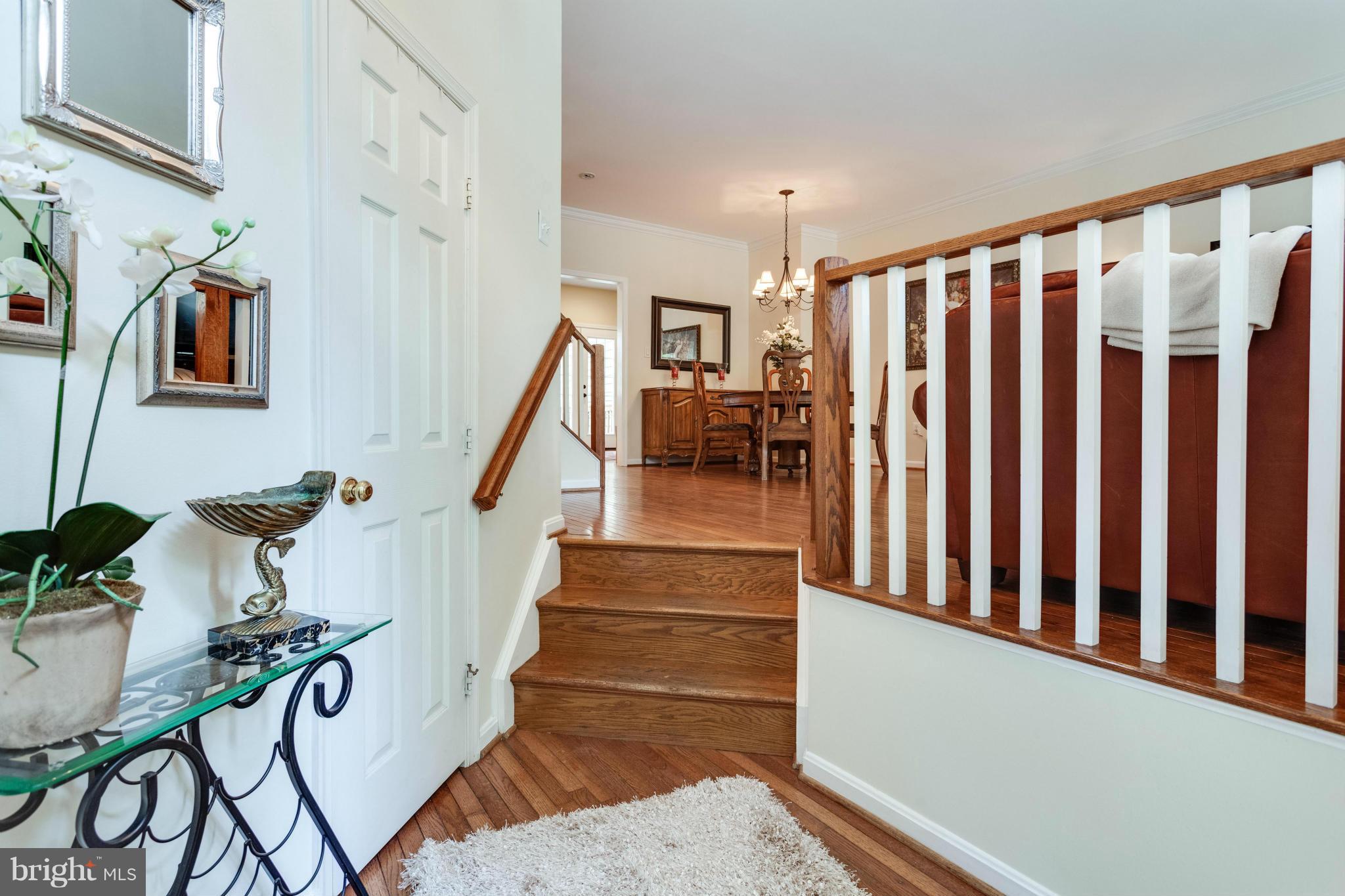 1215 Weatherstone Court Reston, VA 20194 - Photo 2 of 30 a view of entryway with furniture and stairs