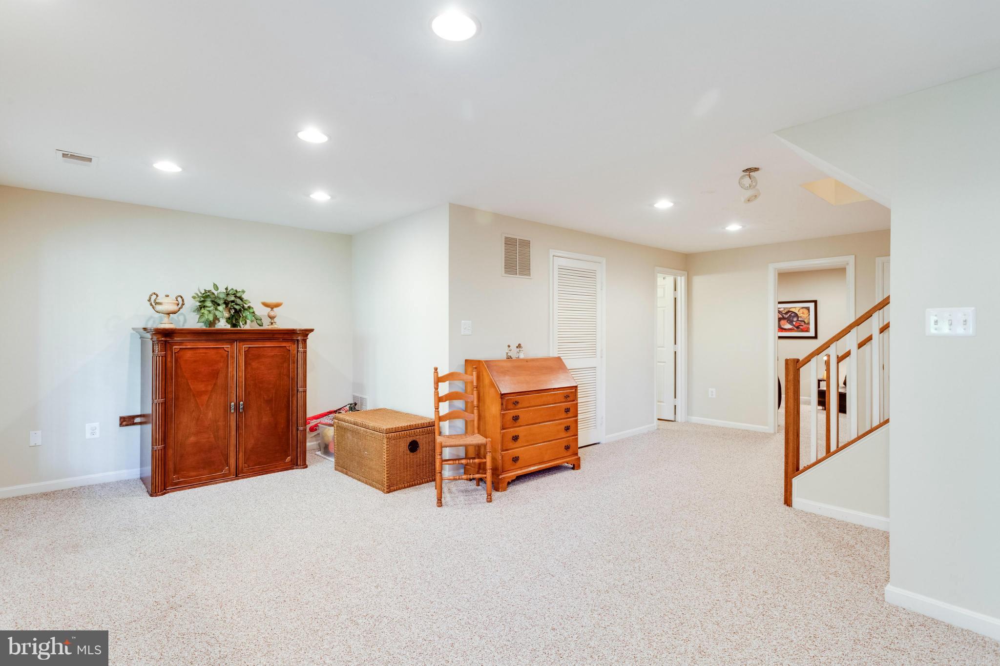 1215 Weatherstone Court Reston, VA 20194 - Photo 23 of 30 a living room with furniture and a wooden floor