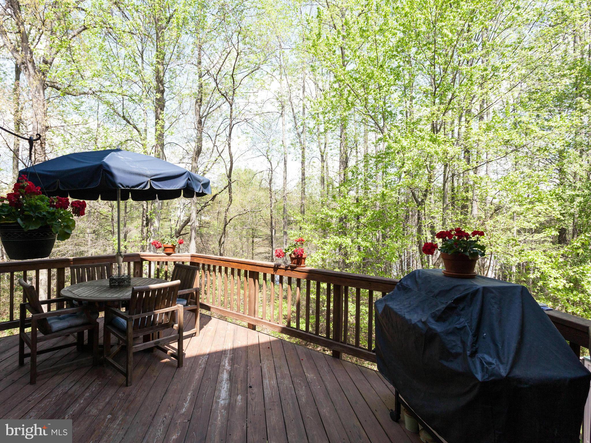 1215 Weatherstone Court Reston, VA 20194 - Photo 27 of 30 a view of a chairs and table on the wooden floor