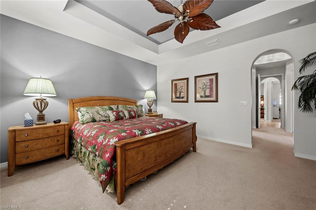 9006 Whitfield Drive Estero, FL 33928 - Photo 16 of 43 a bedroom with a bed and window