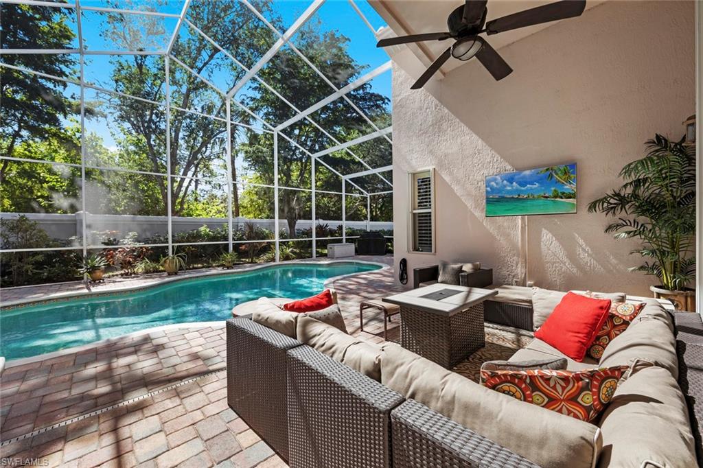 9006 Whitfield Drive Estero, FL 33928 - Photo 26 of 43 a front view of a house with garden