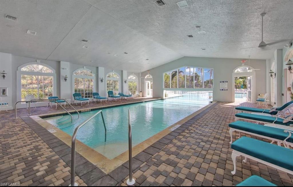 9006 Whitfield Drive Estero, FL 33928 - Photo 38 of 43 a view of a living room and chandelier