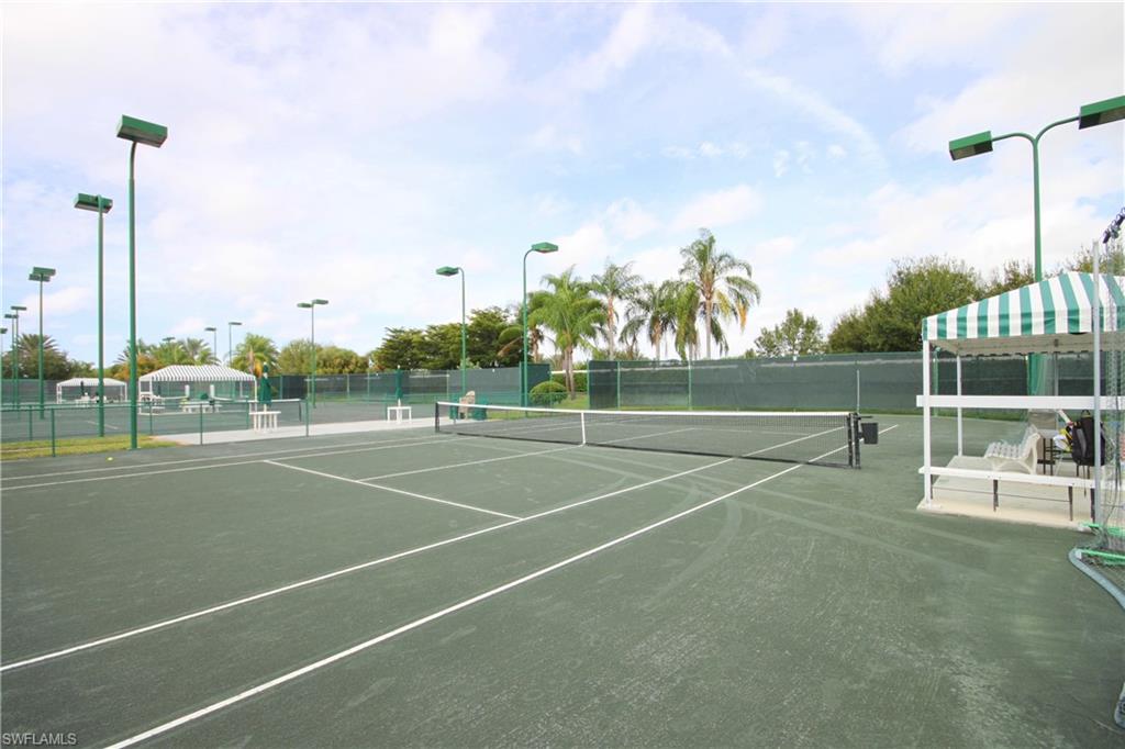 9006 Whitfield Drive Estero, FL 33928 - Photo 41 of 43 a view of a tennis court