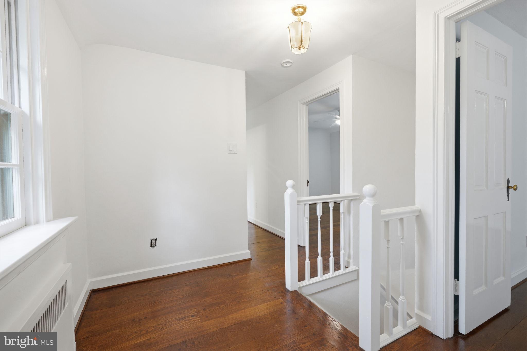 404 Old Farm Road Wyncote, PA 19095 - Photo 20 of 41 Bright and airy hallway with charm.