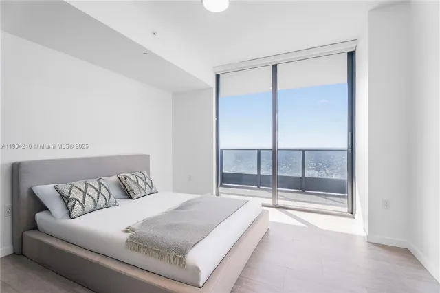 a bathroom with a toilet a sink and a bathtub