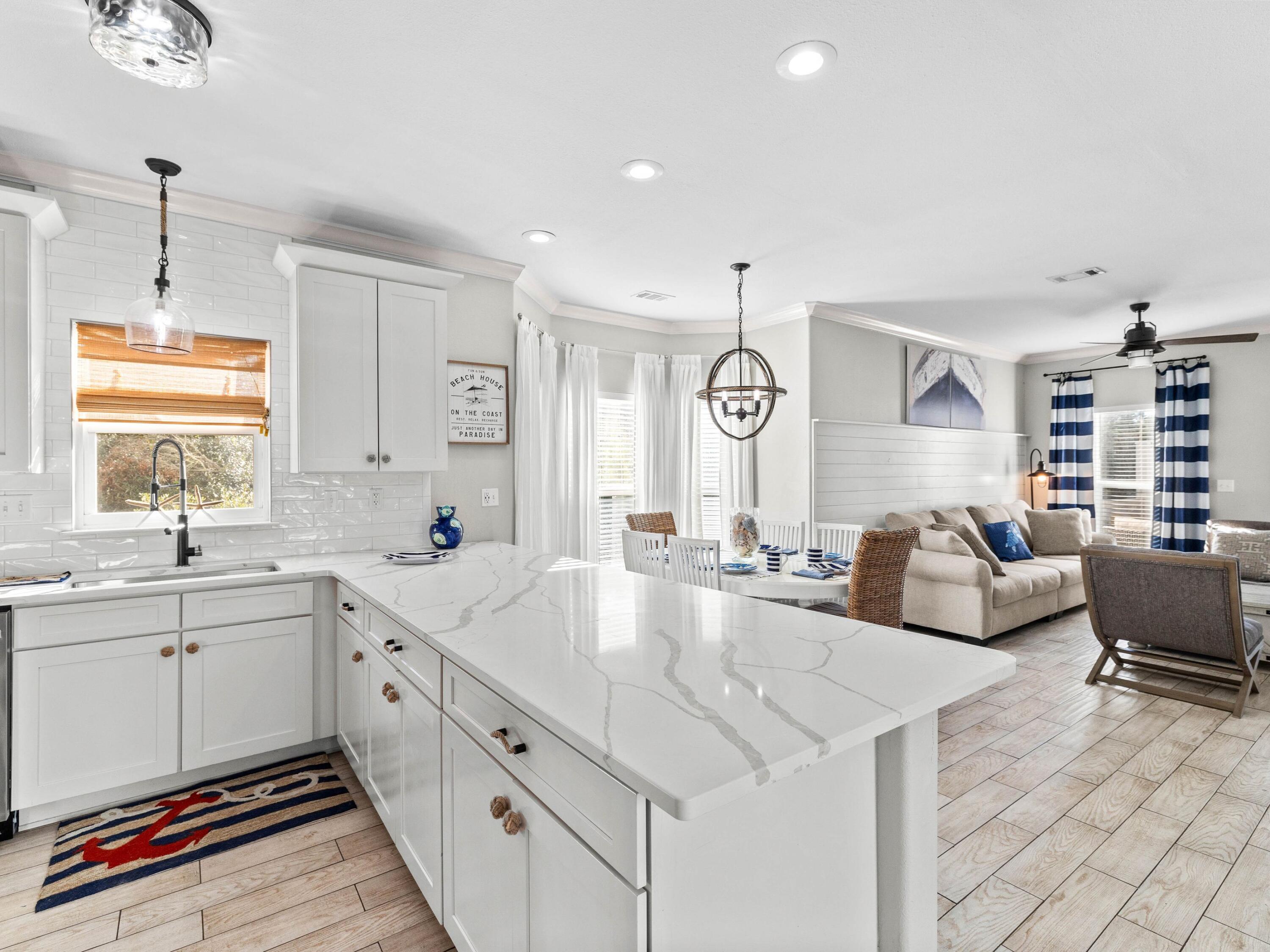 45 Eagles Landing Inlet Beach Inlet Beach, FL 32461 - Photo 13 of 48 a large white kitchen with a stove a sink and a refrigerator